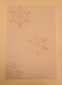 joulukortti hiutaleilla